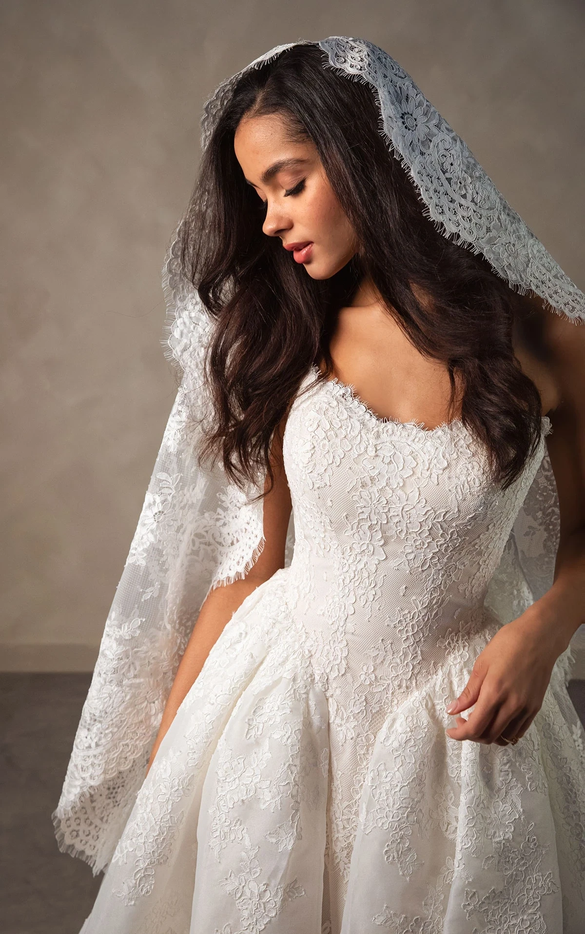 Photo of the model wearing a Essense of Australia gown