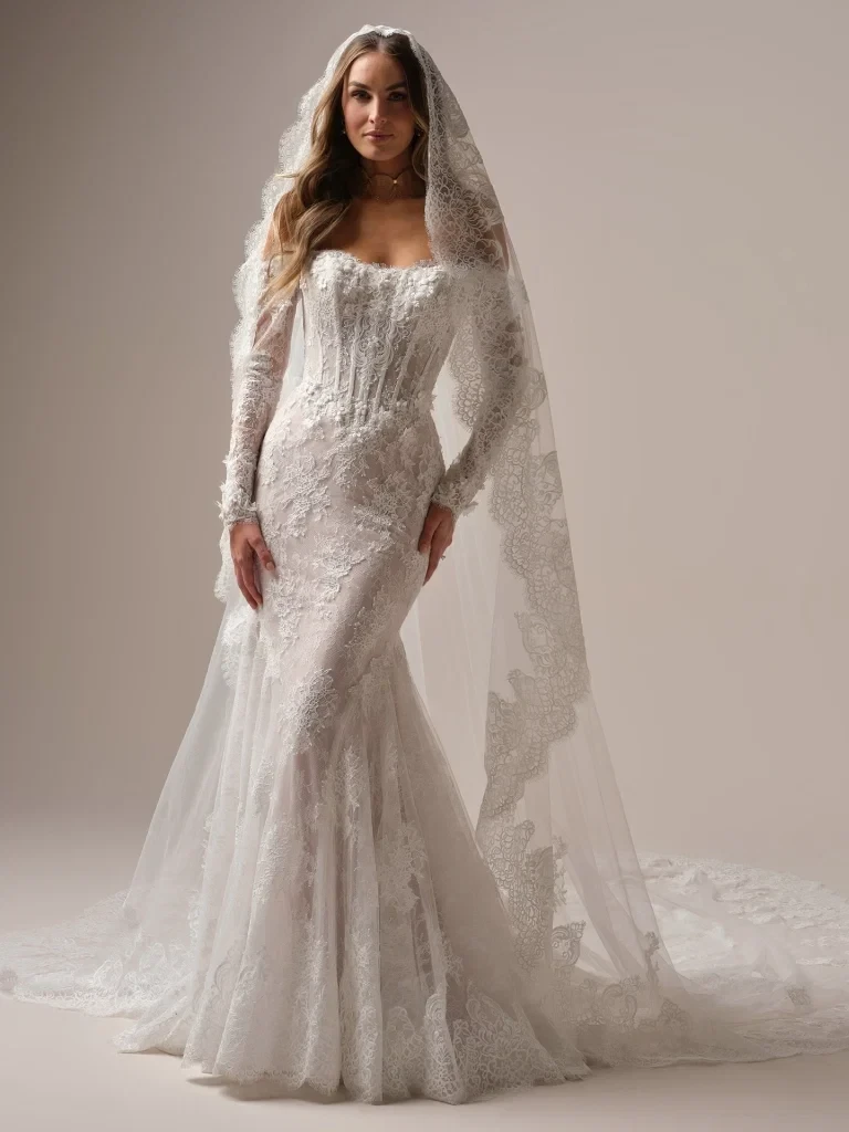 Photo of the model wearing a bridal gown with veil