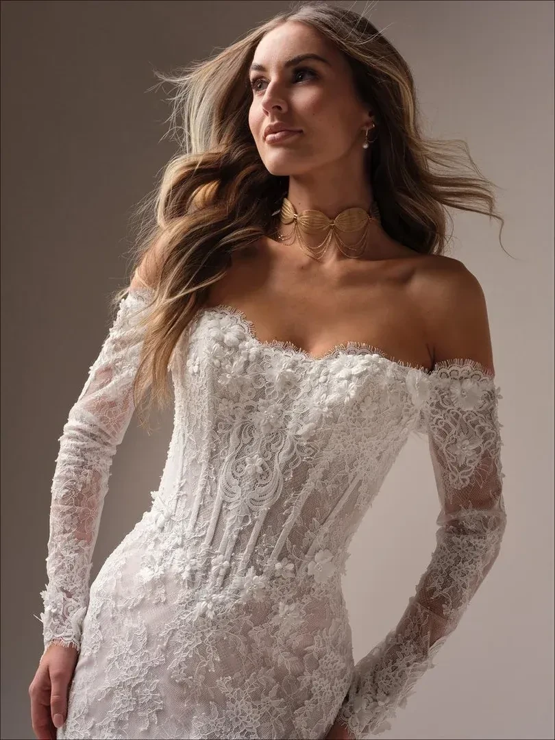 Photo of the model wearing a Maggie Sottero gown