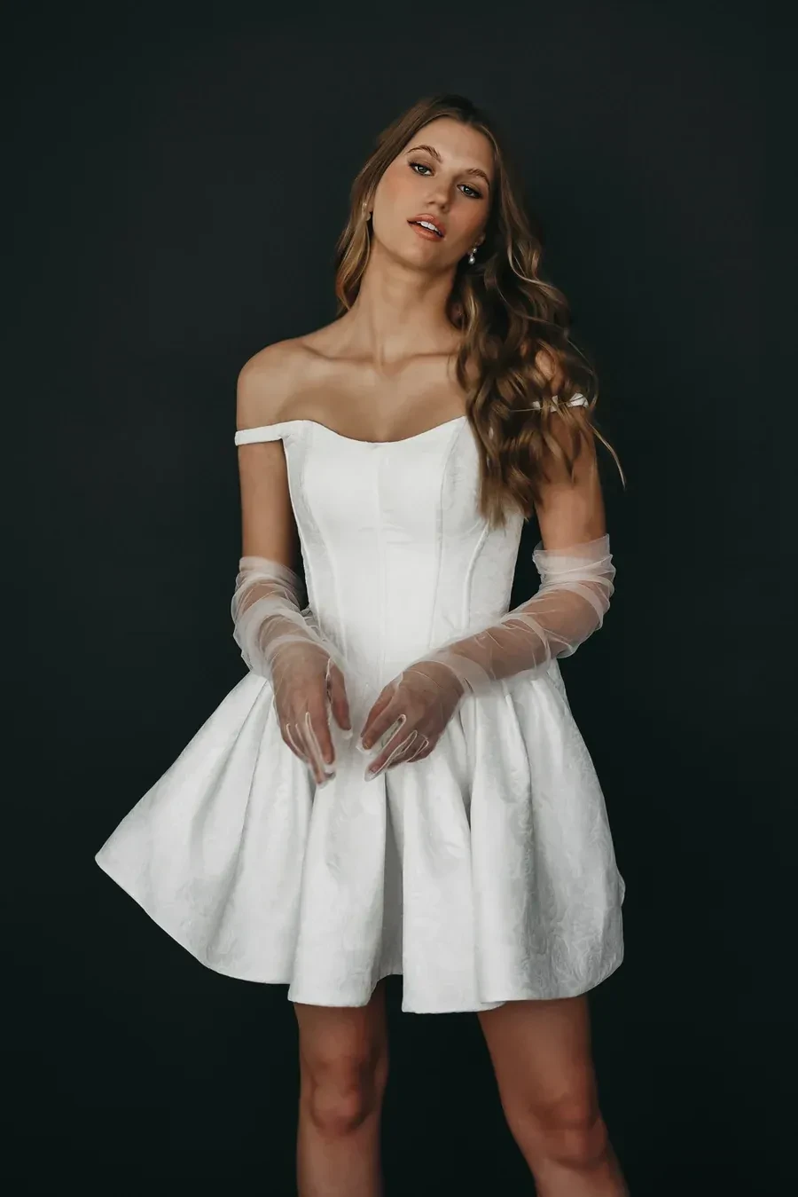 Photo of the model wearing a Mini Dresses gown