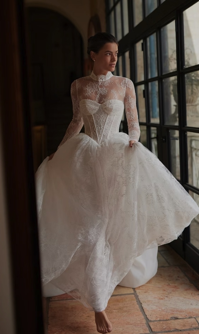 Photo of the model wearing a Arava Polak gown