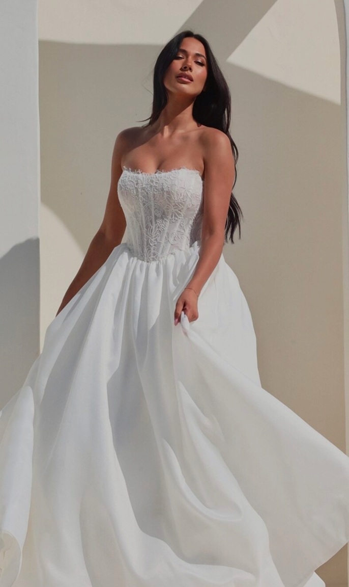 Photo of the model wearing a Martina Liana gown