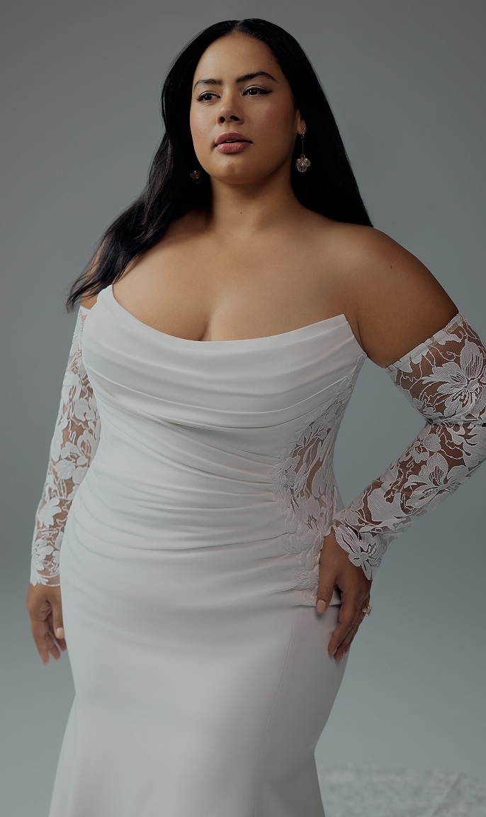Photo of the model wearing a Plus Size Collection gown