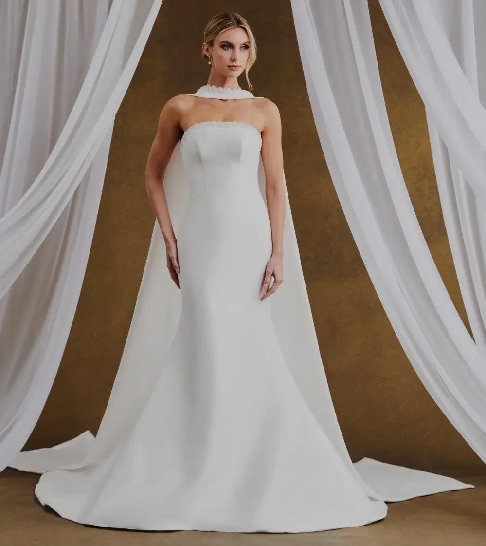 Photo of the model wearing a Kelly Faetanini gown