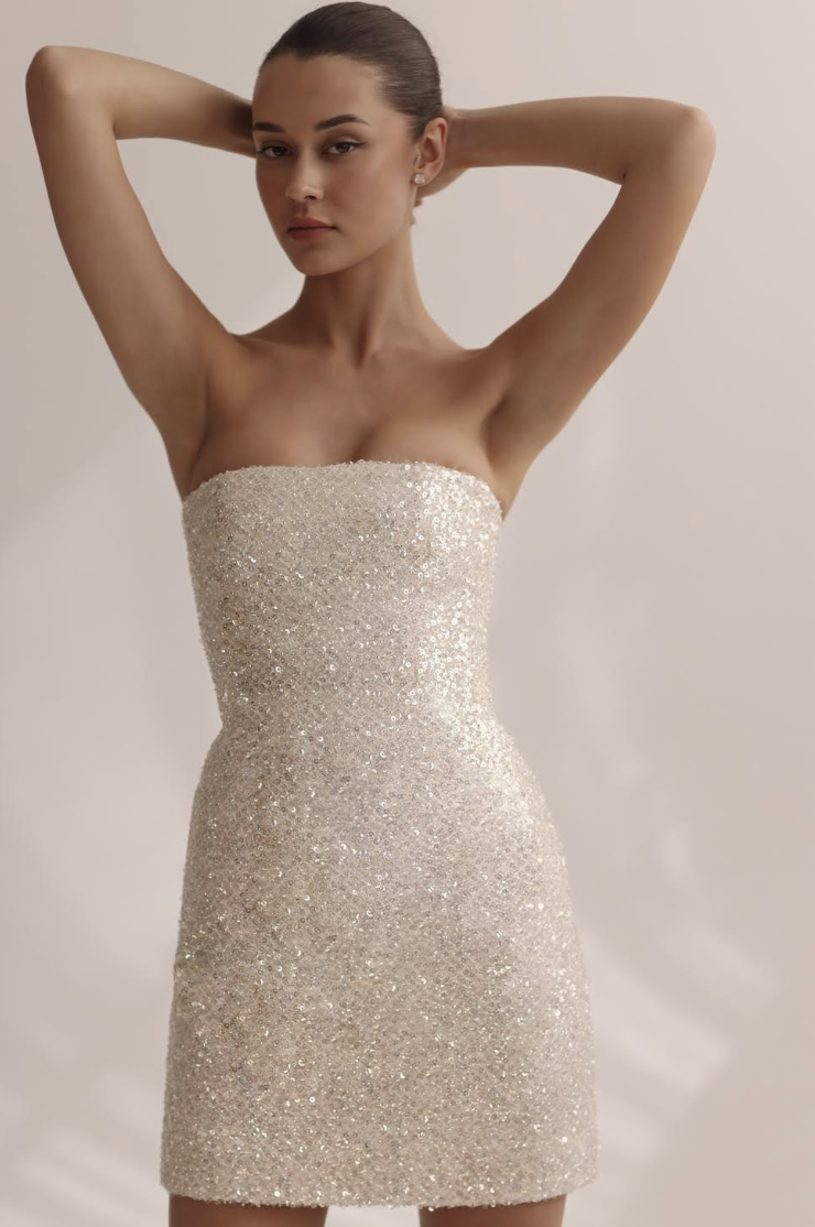 Photo of the model wearing a Mini Dresses gown