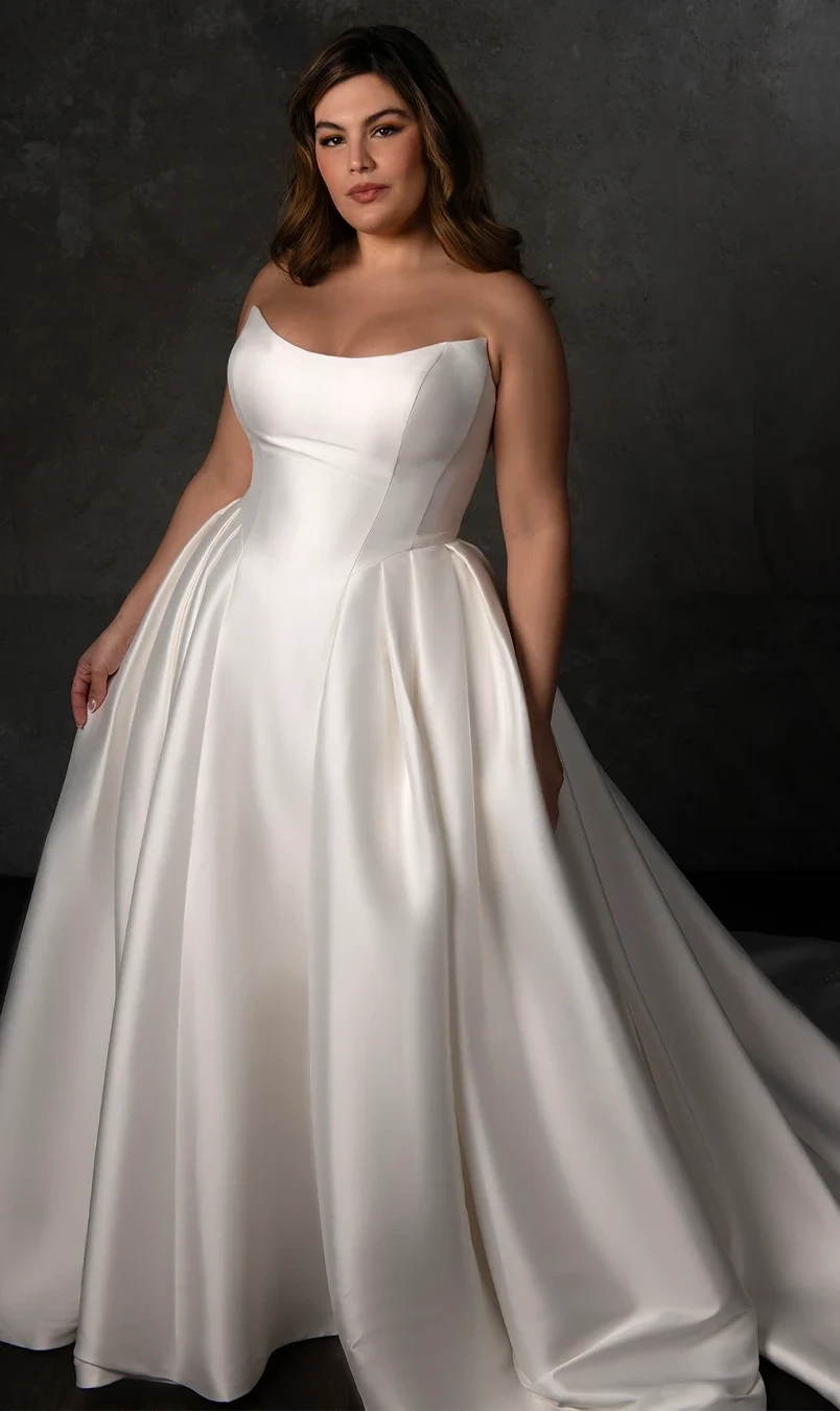 Photo of the model wearing a Plus Size Collection gown